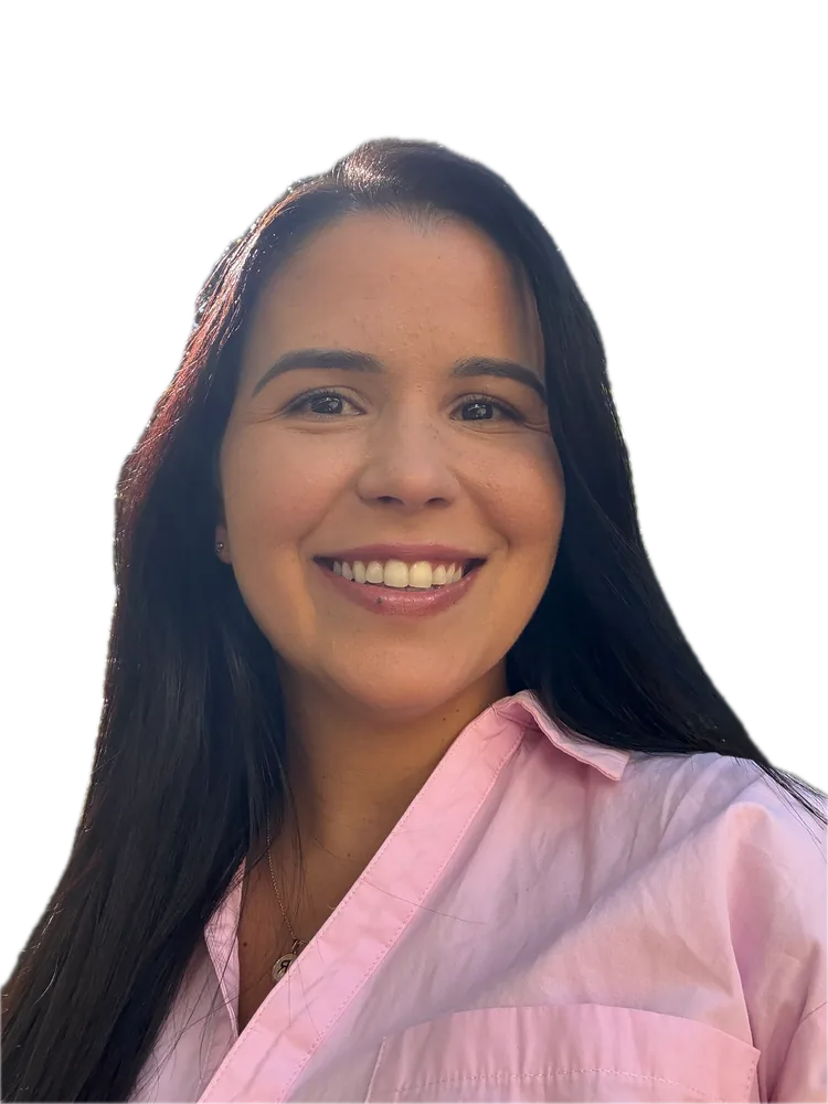 Rafaela smiling in a pink shirt